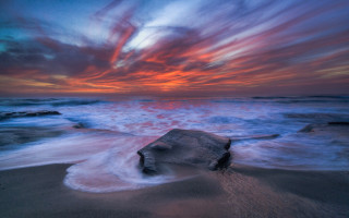 Rock beach sunset waves mountains - the shore free wallpaper