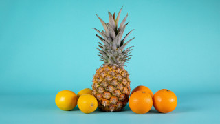 Pineapple orange lemons blue background - a pineapple free wallpaper