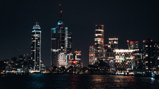 Cityscape night lights boat architecture - the water in front free wallpaper
