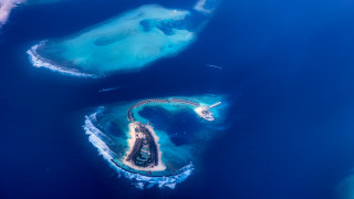 Aerial island plane landing blue - aerial free wallpaper