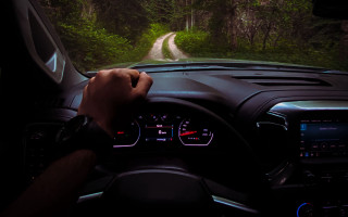 Night driving forest road car - depth of field free wallpaper
