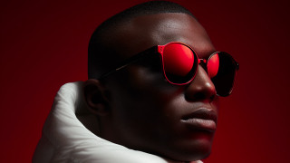 Red sunglasses white shirt afrofuturism - a red background behind free wallpaper