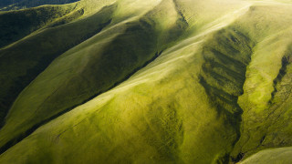 Green mountain plane clouds landscape - a green mountain free wallpaper