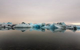 Iceberg lake mountain sky matte - a large iceberg free wallpaper