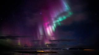 Aurora borealis night sky cityscape - free sky wallpaper