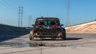 Small car red decal powerlines - a small car free wallpaper