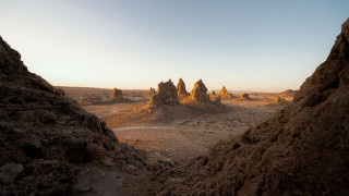 Desert rocks sand formation sky - a desert landscape free wallpaper