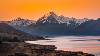 Mountain lake road sunset orange - orange sky above free wallpaper