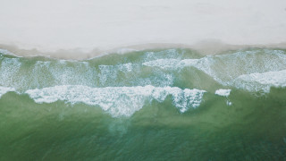 Ocean wave crashing beach microscopic - a view of the ocean free wallpaper