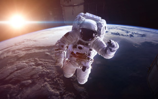 Astronaut earth horizon sun lensflare - space next free wallpaper