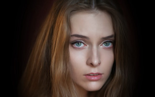 Serious woman long hair blue - shaded free wallpaper