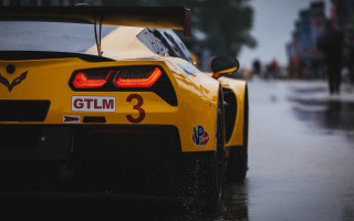 Yellow sports car rain street - cinematic focus free wallpaper
