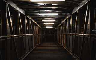 Long hallway metal fence clock - a long hallway free wallpaper