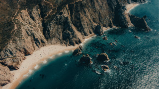 Beach cliff water sky moon - cinematic landscape free wallpaper