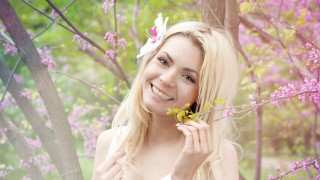 Woman flower hair portrait cherry - a picture in front free wallpaper