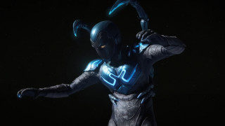 Futuristic man blue suit helmet - a blue suit holding free wallpaper