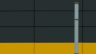 Tall pole yellow wall clock - side of its free wallpaper