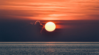 Sunset ocean cloud sky moon - a sunset over the ocean free wallpaper