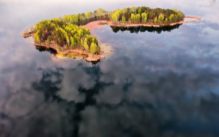 Small island lake trees clouds - a plane free wallpaper for desktop