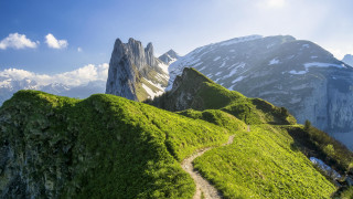 Grassy hill path mountain snow - a grassy hill free wallpaper