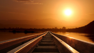 Train water sunset mountain city - a train track free wallpaper for desktop