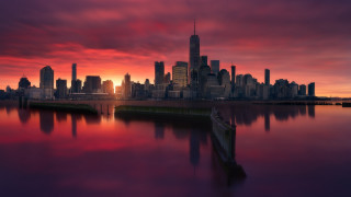 City skyline red sky water 2 - a dock in the foreground free wallpaper