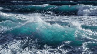 Ocean waves beach sunset ship - side and a person free wallpaper