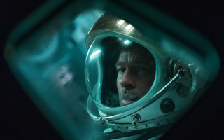 Man space suit earth sky - free space wallpaper for desktop