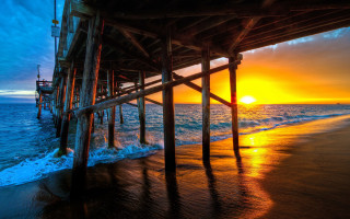 Pier sunset ocean waves beach - a pier free wallpaper