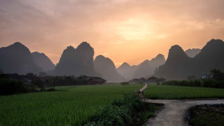 Field path village mountains sunset - a village free wallpaper