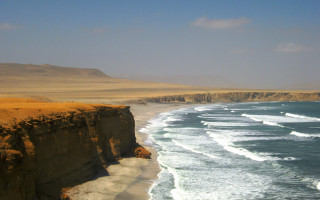 Cliff overlooking ocean waves shore - a cliff free wallpaper