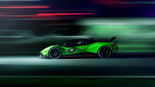 Green sports car night motion - a green sports car free wallpaper