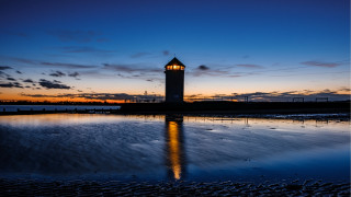 Clock tower sunset beach water - a clock tower free wallpaper