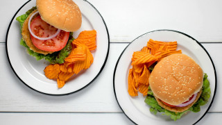 Two plates hamburgers chips white - a white table top free wallpaper