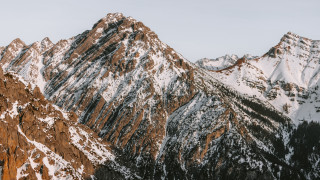Snowy mountain range bare tree - ada hill walker free wallpaper