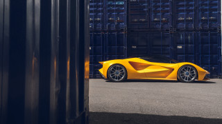 Yellow sports car shipping container - side profile free wallpaper