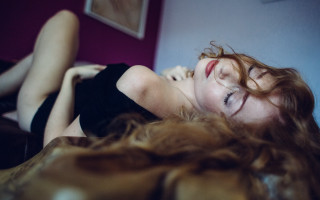 Woman lying blurry flowing hair - flowing free wallpaper