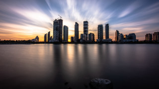 City skyline water clouds futurism - david park free wallpaper