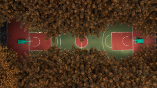 Basketball court trees grass sunset - a basketball court free wallpaper