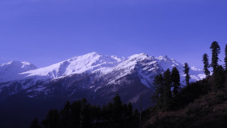 Mountain range trees blue sky 10 - derek chittock free wallpaper