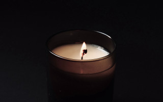 Candle lit dark table black - a candle free wallpaper