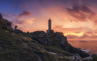 Lighthouse rocky cliff sunset mystical - a rocky cliff free wallpaper for desktop