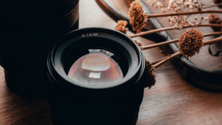 Camera lens flower background lenscap - a camera len free wallpaper