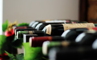 Wine bottles ribbon still life - a table together free wallpaper