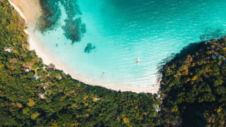 Tropical beach boat people aerial - the water and a boat free wallpaper