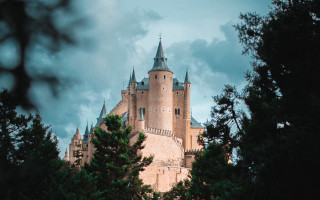 Castle clock tower forests clouds - romanesque free wallpaper