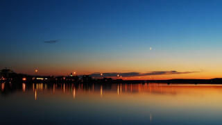 Lake city sunset crescent moon - a city in the distance free wallpaper for desktop
