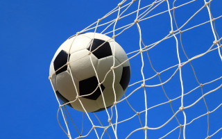 Soccer ball net goal blue - a soccer ball free wallpaper