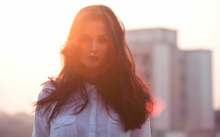 Woman sunshine hair building portrait - claire falkenstein free wallpaper