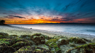 Beach sunset rocky shore mountain - alan sutherland free wallpaper